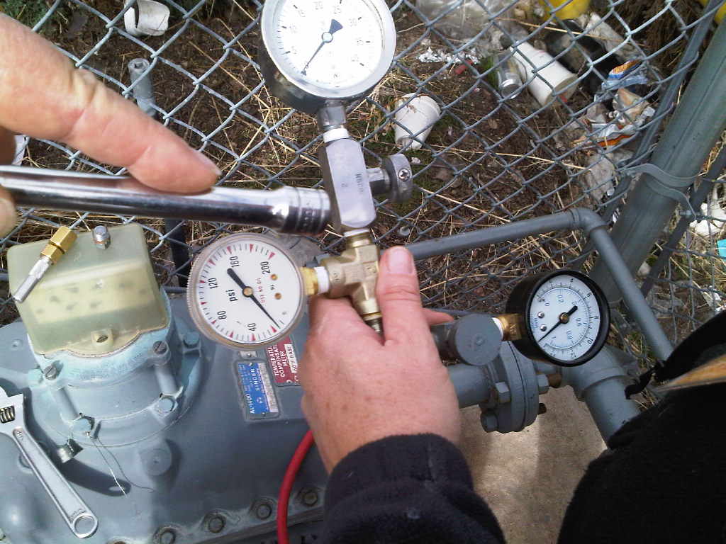 Technician calibrating instrument